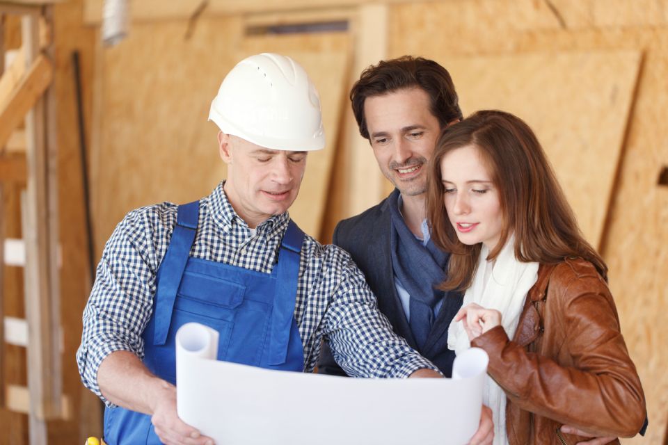 foreman showing house design