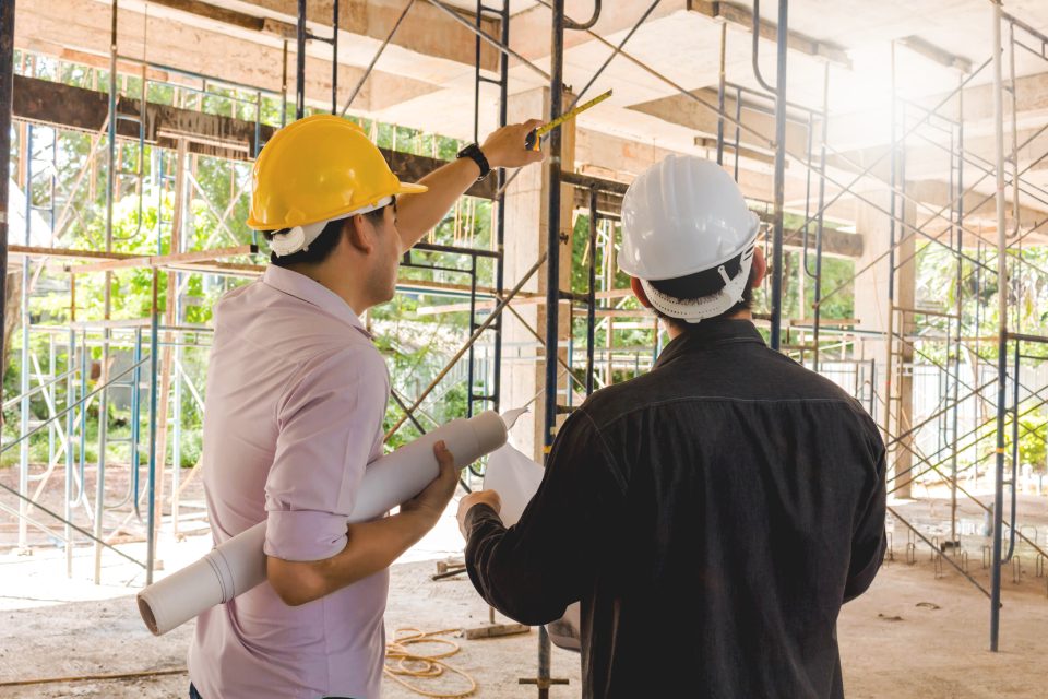 two business man construction site engineer