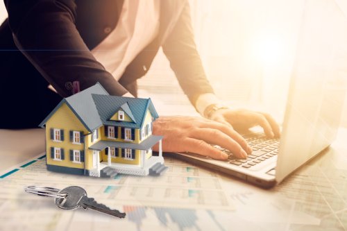 Businessmen signing home titles with insurance, care about real estate services and the idea of real estate agents offering interest in installments to their customers.